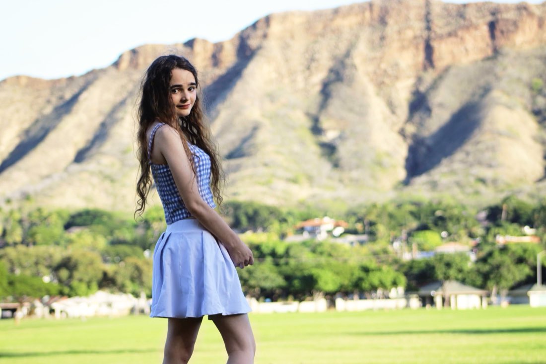 On the grass below Diamond Head.