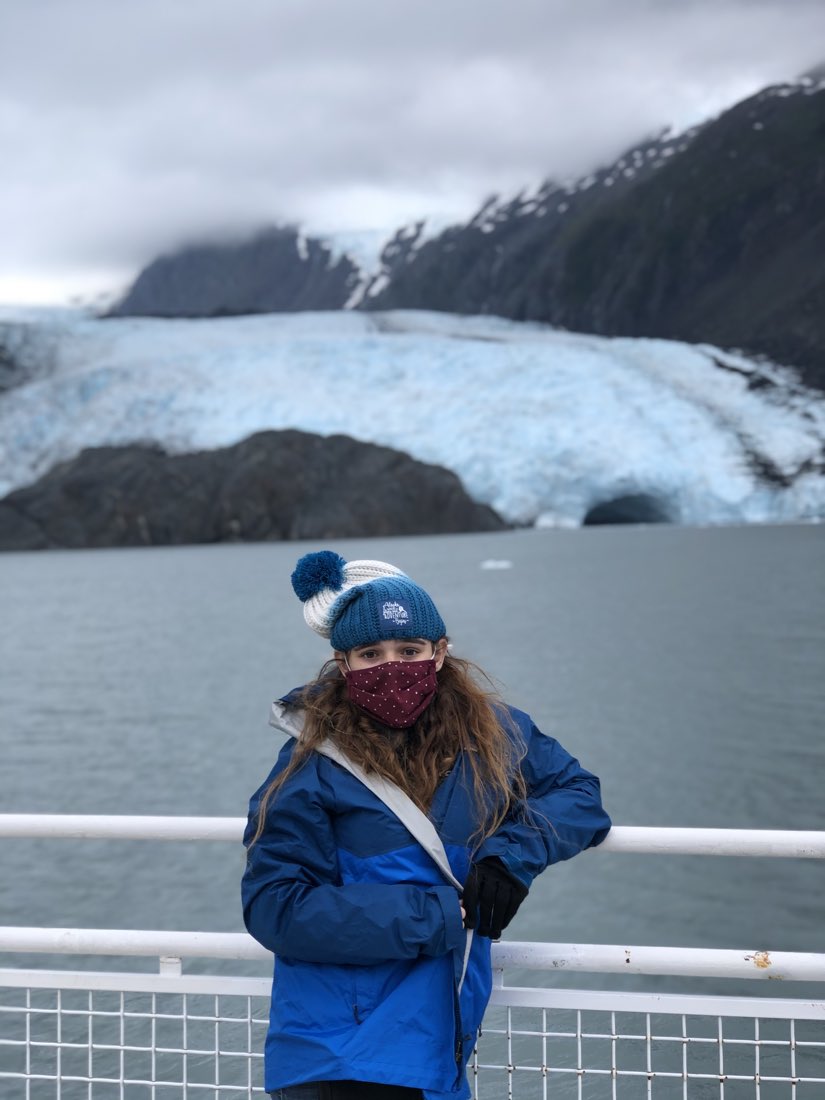 At the boat rail on Portage Lake, the glacier and low cloud behind.