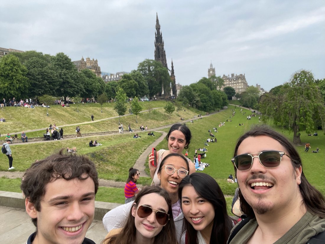 In Princes Street Gardens with friends, the Scott Monument behind.